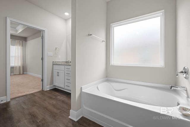 24884 Smarty Jones Cir, Daphne, AL 36526 - full bath featuring vanity, a garden tub, wood finished floors, and recessed lighting