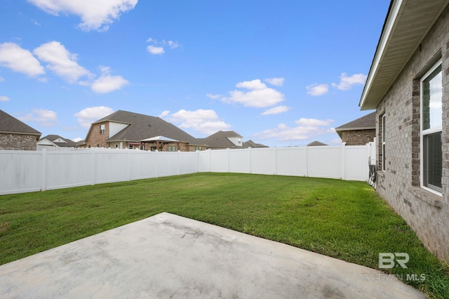 24884 Smarty Jones Cir, Daphne, AL 36526 - fenced backyard with a patio and a residential view