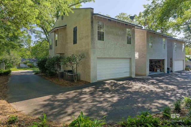 view of property exterior with a garage