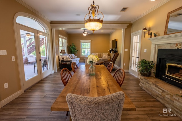 9150 County Road 91, Lillian, AL 36549 - dining area with french doors, ceiling fan, dark wood-type flooring, and crown molding
