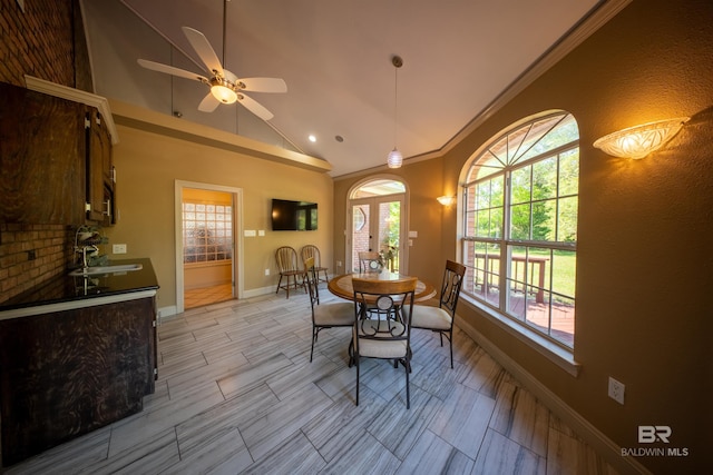 9150 County Road 91, Lillian, AL 36549 - dining space featuring baseboards, lofted ceiling, ceiling fan, and ornamental molding