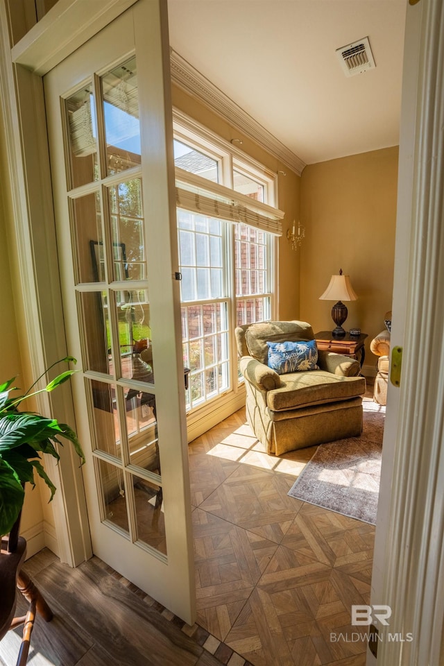 9150 County Road 91, Lillian, AL 36549 - sitting room featuring healthy amount of natural light and crown molding