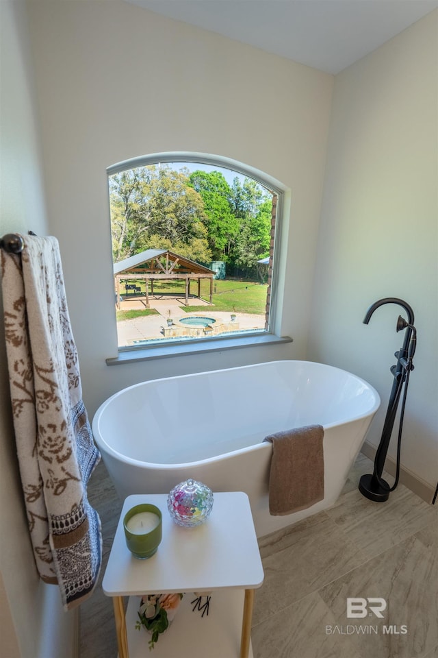 9150 County Road 91, Lillian, AL 36549 - bathroom with a freestanding bath