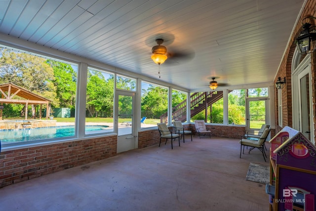 9150 County Road 91, Lillian, AL 36549 - sunroom featuring ceiling fan and view of wooded area