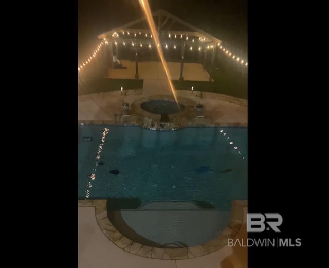 9150 County Road 91, Lillian, AL 36549 - view of pool at twilight