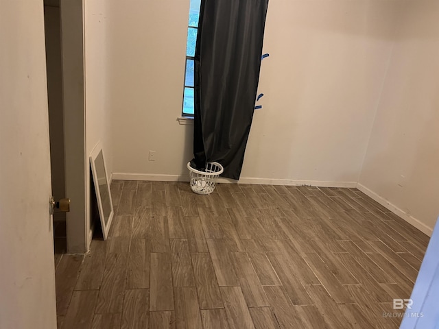 4303 Panorama Blvd, Mobile, AL 36609 - empty room featuring baseboards and wood finished floors