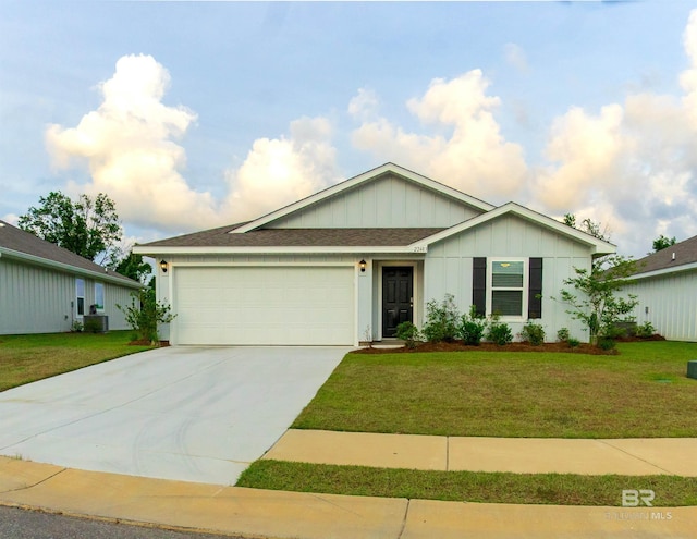 ranch-style house with a garage, concrete driveway, central AC, and a front yard