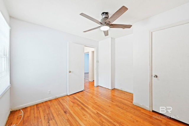 unfurnished bedroom featuring ceiling fan and light hardwood / wood-style floors