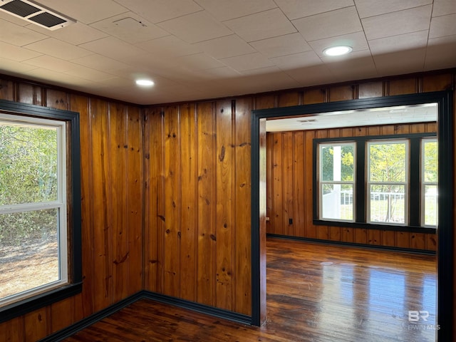 7121 N Century Blvd, Century, FL 32535 - unfurnished room with wood finished floors, wood walls, and recessed lighting
