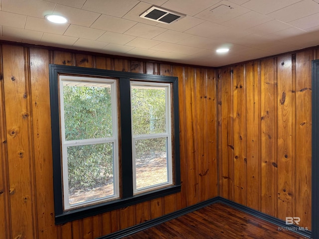 7121 N Century Blvd, Century, FL 32535 - unfurnished room featuring dark wood-style flooring and wooden walls