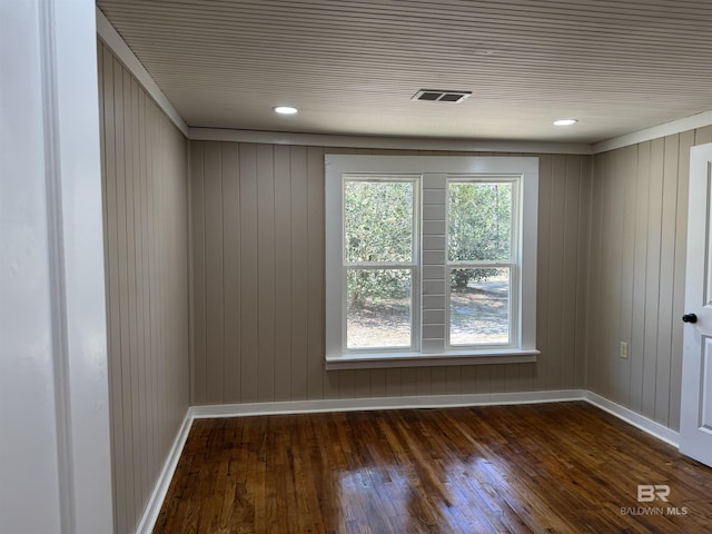 7121 N Century Blvd, Century, FL 32535 - empty room with dark wood-type flooring, baseboards, and recessed lighting