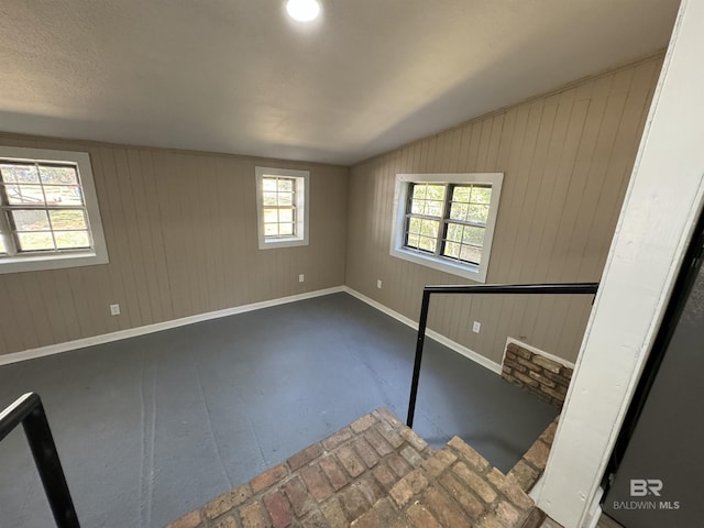 7121 N Century Blvd, Century, FL 32535 - empty room featuring baseboards and healthy amount of natural light