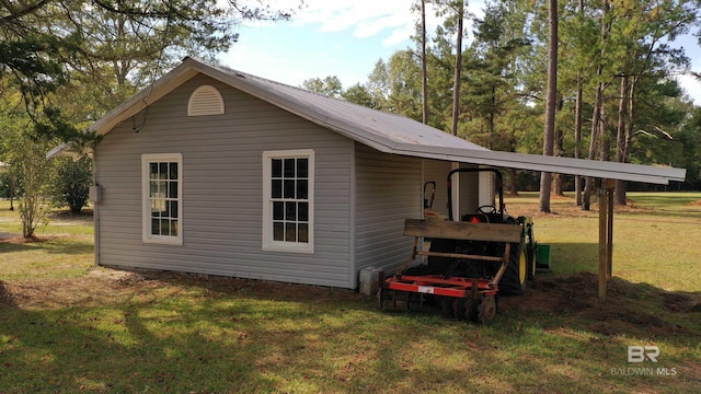 7121 N Century Blvd, Century, FL 32535 - view of outbuilding featuring a carport