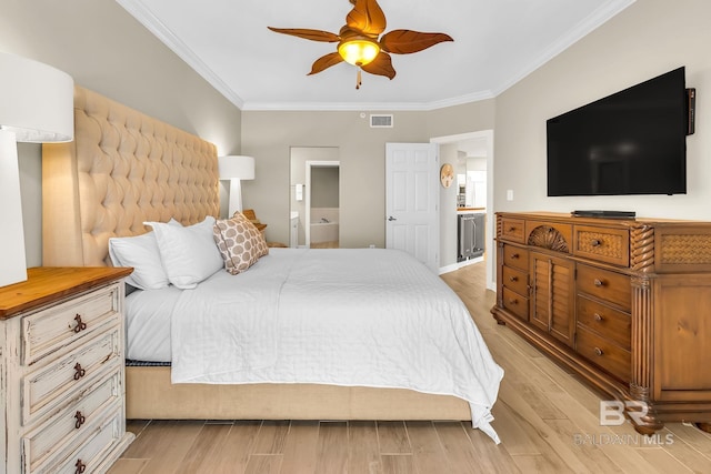 26200 Perdido Beach Blvd Unit 1403, Orange Beach, AL 36561 - bedroom featuring crown molding, connected bathroom, light wood finished floors, and ceiling fan