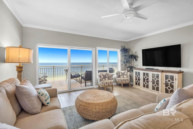 26200 Perdido Beach Blvd Unit 1403, Orange Beach, AL 36561 - living area with ornamental molding, a ceiling fan, and wood finished floors
