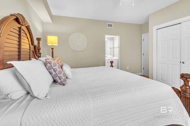 26200 Perdido Beach Blvd Unit 1403, Orange Beach, AL 36561 - bedroom with a closet and a ceiling fan