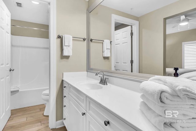 26200 Perdido Beach Blvd Unit 1403, Orange Beach, AL 36561 - bathroom featuring vanity, wood finished floors, shower / bath combination, and ceiling fan