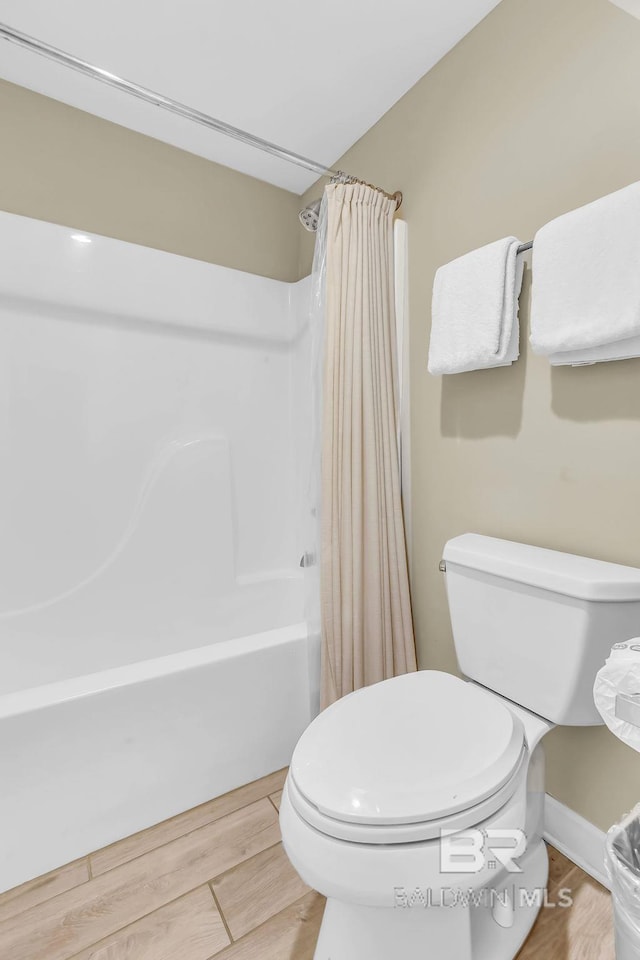 26200 Perdido Beach Blvd Unit 1403, Orange Beach, AL 36561 - bathroom featuring shower / tub combo and wood finished floors