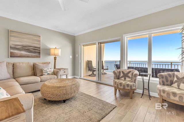 26200 Perdido Beach Blvd Unit 1403, Orange Beach, AL 36561 - living room featuring light wood-style flooring, a water view, and crown molding