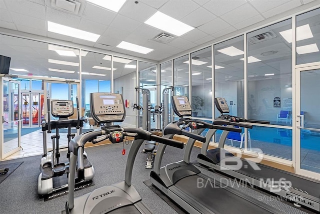 26200 Perdido Beach Blvd Unit 1403, Orange Beach, AL 36561 - gym featuring expansive windows, french doors, and a drop ceiling