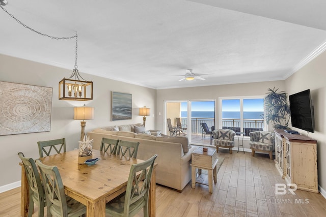 26200 Perdido Beach Blvd Unit 1403, Orange Beach, AL 36561 - dining room with ornamental molding, light wood-style flooring, and a ceiling fan