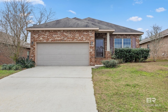 view of front of house with a front yard and a garage