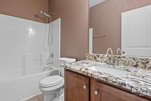 full bathroom featuring toilet, vanity,  shower combination, and tile patterned flooring