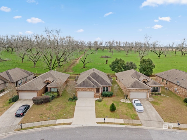 birds eye view of property featuring a rural view