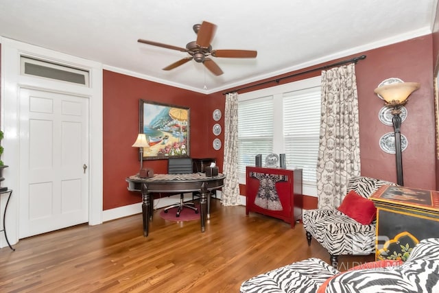 office with ceiling fan, ornamental molding, and hardwood / wood-style flooring