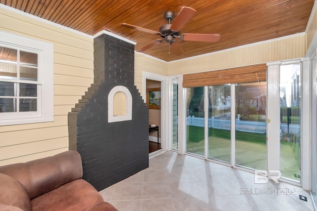 tiled living room featuring wood ceiling, wood walls, and ceiling fan