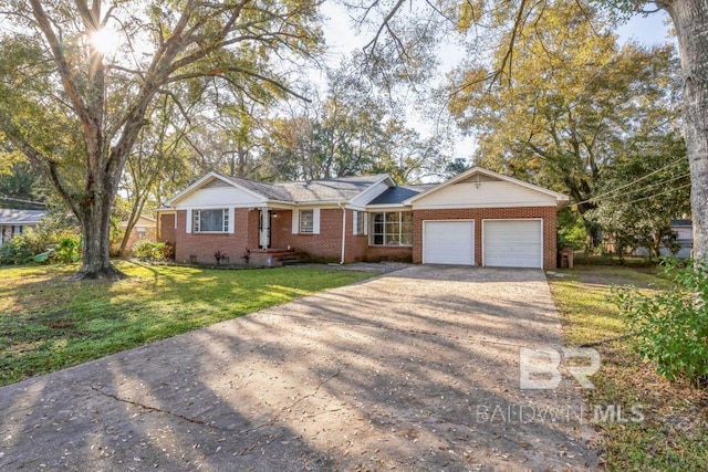 ranch-style home with driveway, an attached garage, crawl space, a front lawn, and brick siding