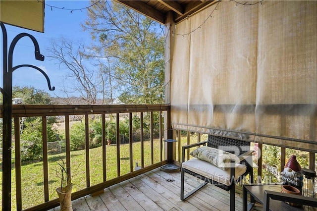 wooden balcony featuring a deck