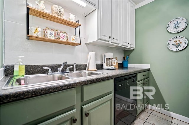 kitchen with sink, dishwasher, white cabinetry, and light tile patterned floors