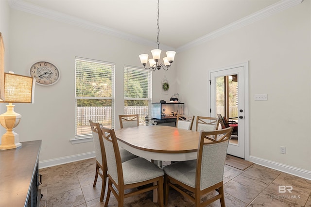 dining area with ornamental molding, a chandelier, and a healthy amount of sunlight