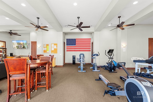 exercise area with recessed lighting and baseboards