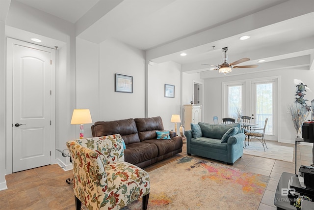 living area with baseboards, ceiling fan, light tile patterned floors, beam ceiling, and recessed lighting