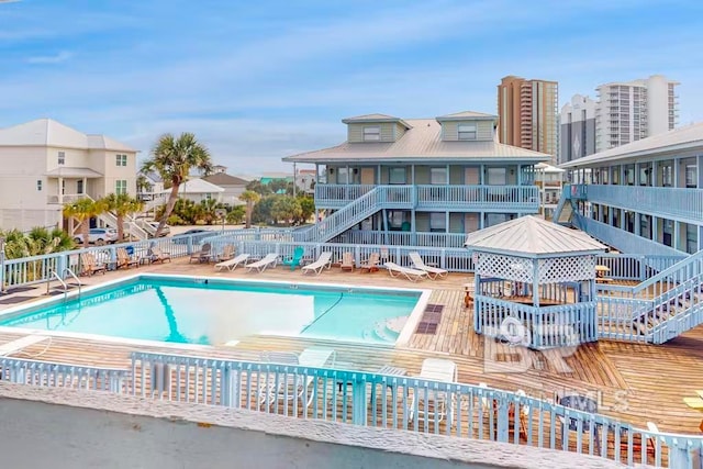 view of swimming pool with a patio area