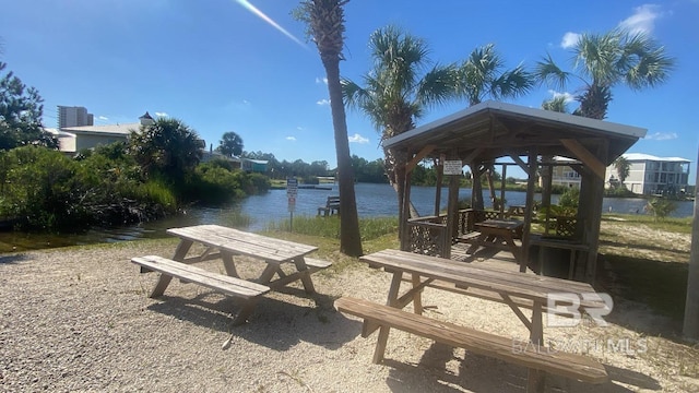 view of community featuring a gazebo and a water view