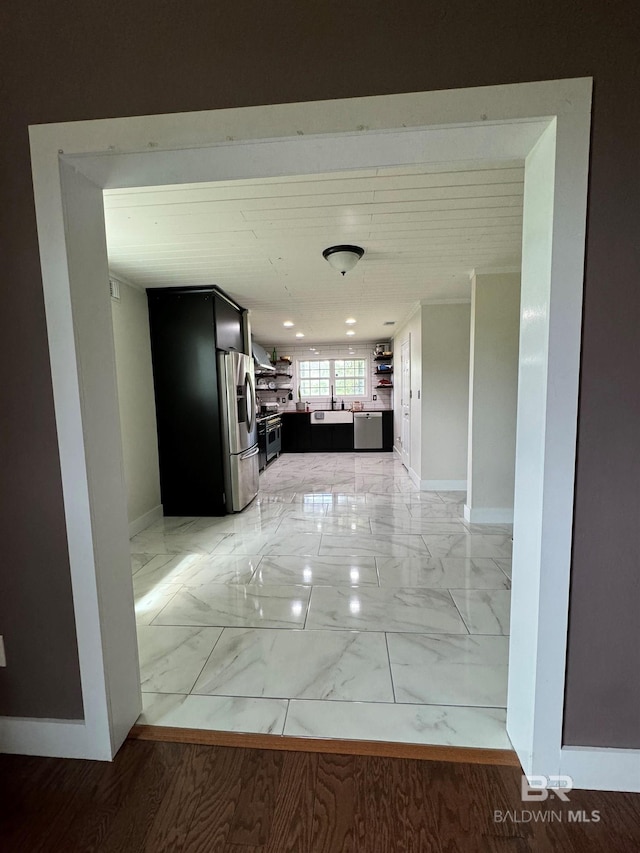 hall featuring light tile patterned floors