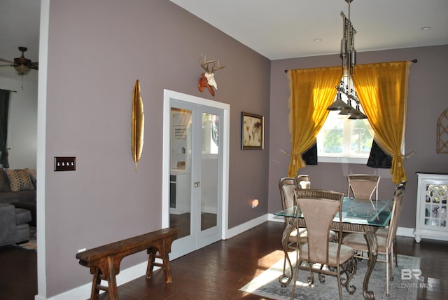 dining space with dark hardwood / wood-style flooring, french doors, and ceiling fan