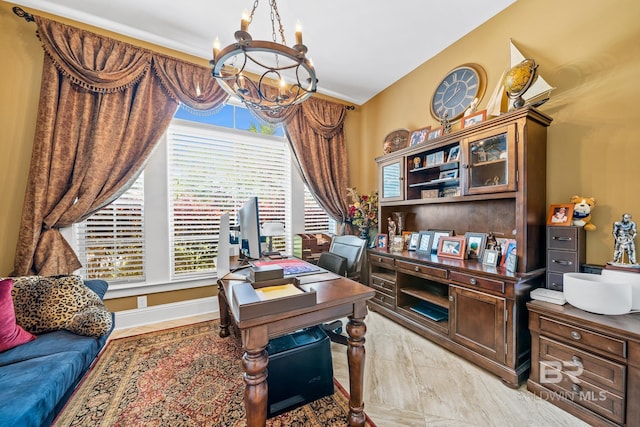 office area with a notable chandelier