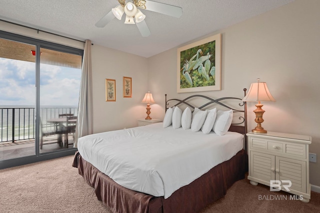 carpeted bedroom featuring a textured ceiling, ceiling fan, and access to outside