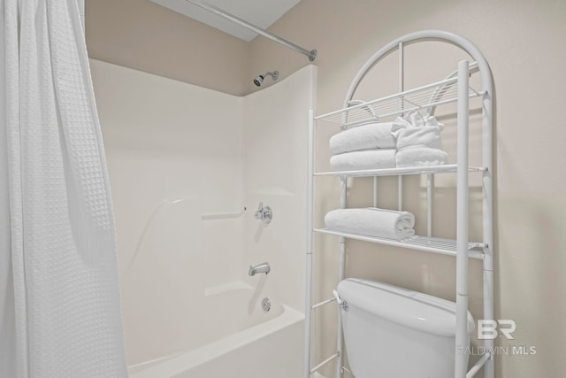 bathroom with toilet and shower / bathtub combination with curtain