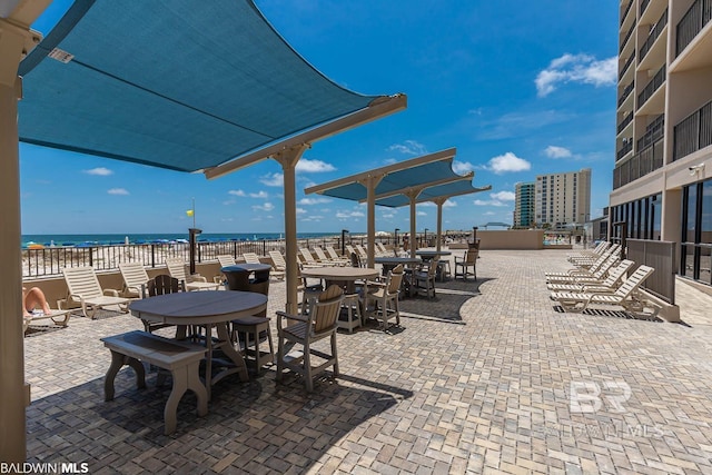 view of patio featuring a water view