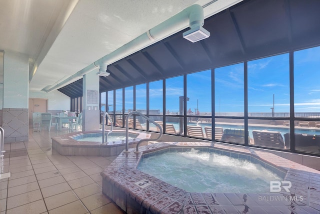 view of pool featuring an indoor in ground hot tub