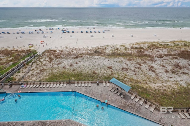 bird's eye view with a view of the beach and a water view