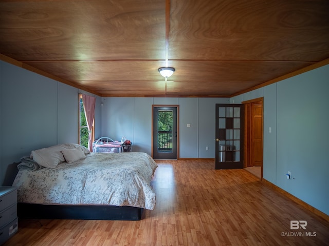 bedroom with wood finished floors