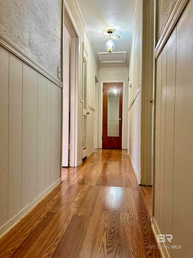 doorway to outside with light wood-type flooring