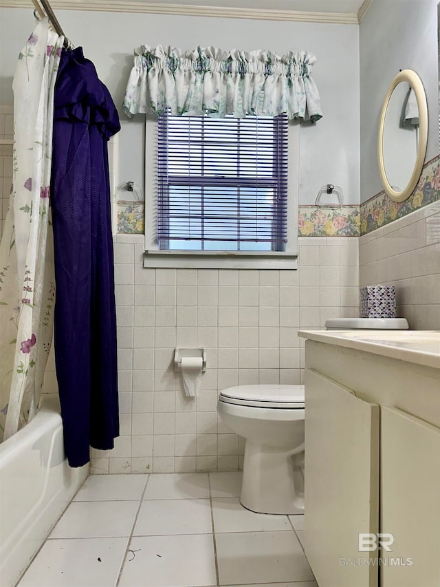 full bathroom with tile walls, vanity, and toilet