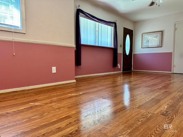 entryway featuring ceiling fan and hardwood / wood-style flooring